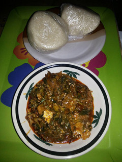 A picture of Okra Soup with Eba.