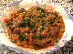 Una foto de Osso Buco (lagarto con hueso en salsa)