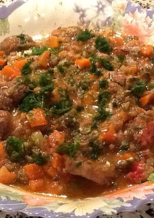 Una foto de Osso Buco (lagarto con hueso en salsa)