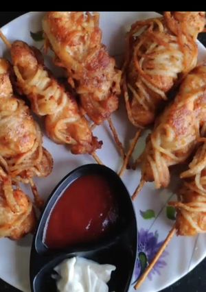 A picture of Noodles wrapped chicken.