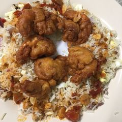 A picture of Battered prawn n fried rice.