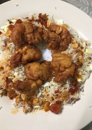 A picture of Battered prawn n fried rice.