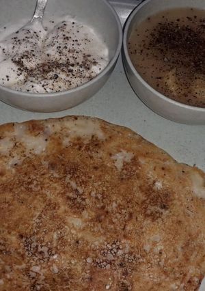 A picture of Ekadashi chilla with rasa aloo.