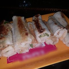 A picture of Saucy and creamy chicken rolls.