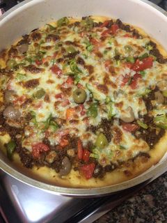 صورة لوصفة بيتزا باللحمه المفرومه 😋😋