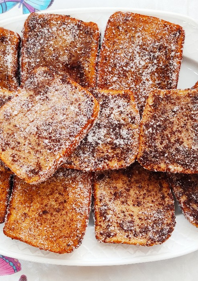 Una foto de Torrijas con mucha canela 👌😋🤤