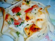 Una foto de canastitas caprese