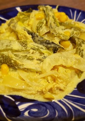 A picture of Rajas Poblanas with Chicken and Creamy Curry Sauce.