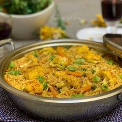 A picture of Chinese fried rice and roasted spicy cauliflower with turmeric🍷.