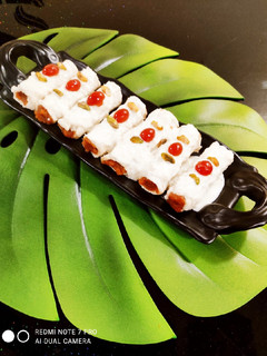 A picture of Sweet Bread Roll with Bread Rabdi.