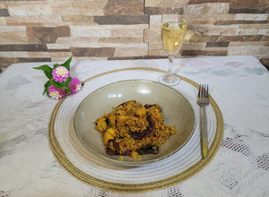 Una foto de Paella de pollo