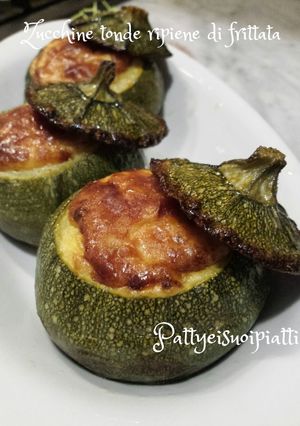 Foto di Zucchine tonde ripiene di frittata