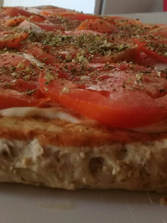 Una foto de Pizza integral, napolitana