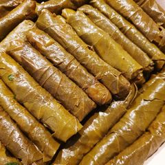 A picture of Dolma (Stuffed vine leaf).