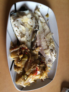 Una foto de Lomos de rodaballo en papillote con patatas panaderas