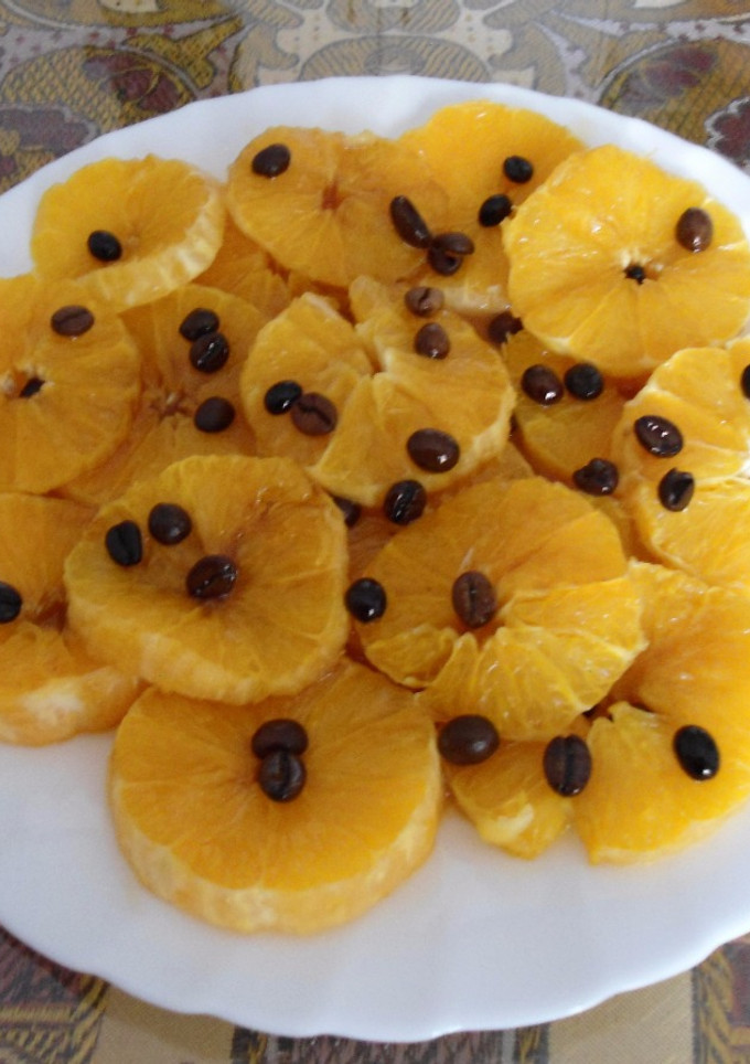 Una foto de Naranjas flambeadas