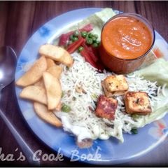 A picture of Butter Paneer Sizzler in a Pan.