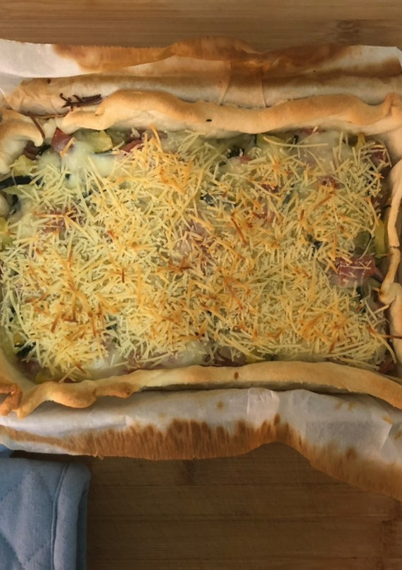Una foto de Pastel de calabacín, jamón y queso
