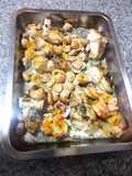 Rape al horno con chirlas y pota