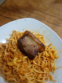 A picture of Title: Jollof Spaghetti and Macaroni.