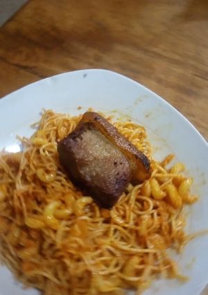 A picture of Title: Jollof Spaghetti and Macaroni.