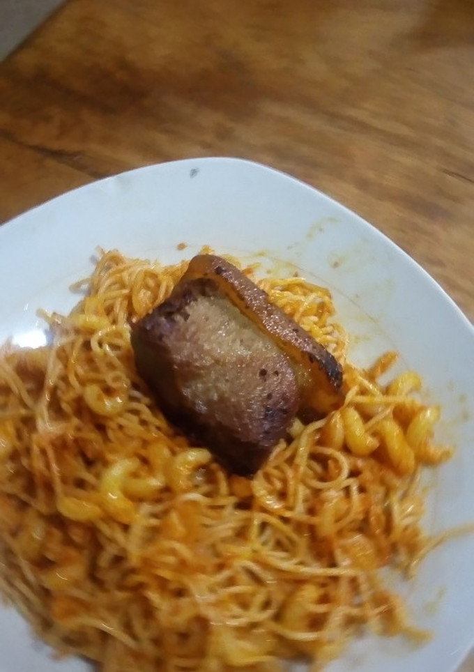 A picture of Title: Jollof Spaghetti and Macaroni.