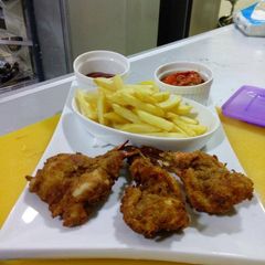 A picture of Chicken and chips.