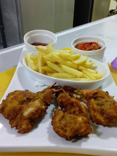 A picture of Chicken and chips.