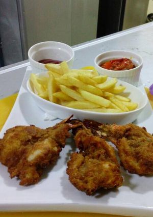A picture of Chicken and chips.