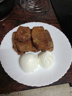 Una foto de Torrijas chocolateadas con helado
