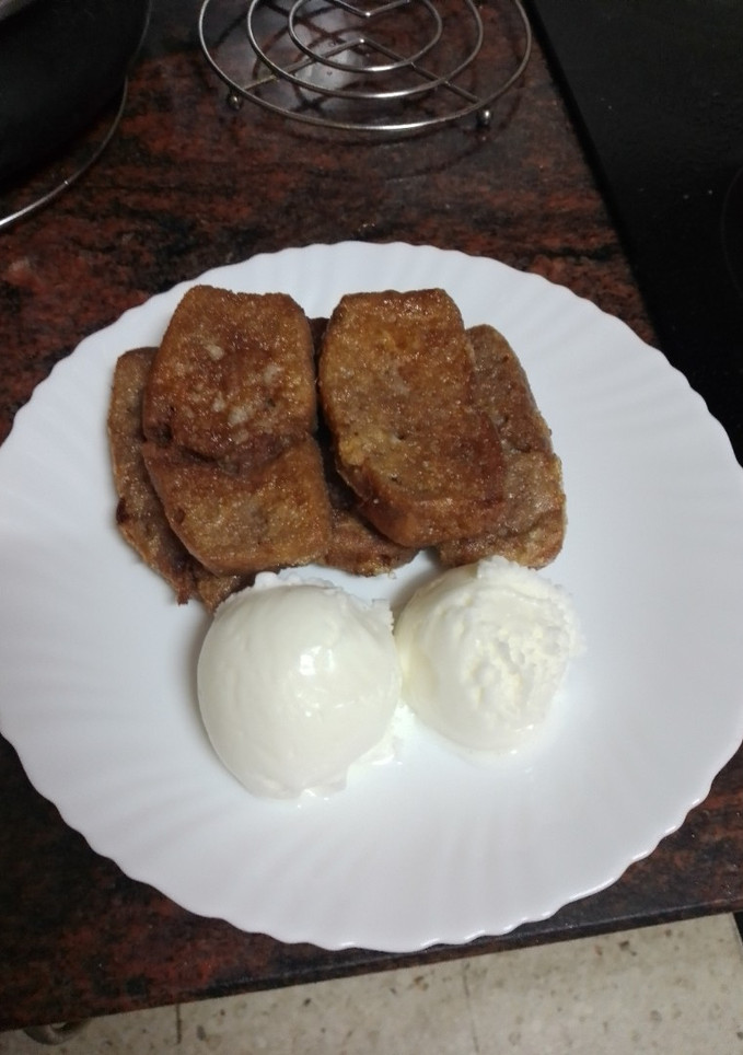 Una foto de Torrijas chocolateadas con helado