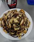 Frituras con coco bañadas con chocolate