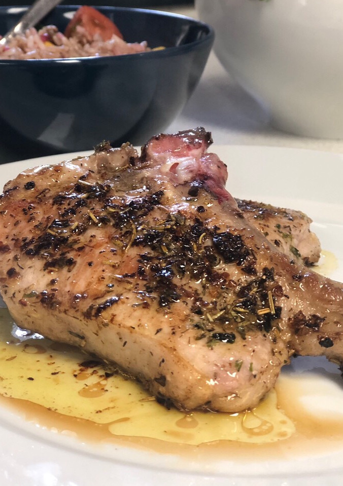 Una foto de Chuletas de cerdo a las finas hierbas