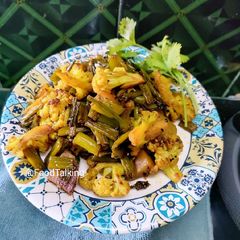 A picture of Cauliflower (Govi) Aloo Fry with Onion Flowers.