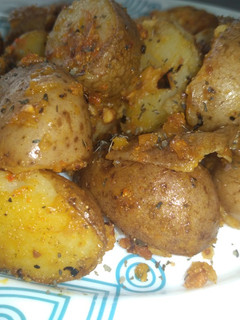 Una foto de Deliciosas papas al ajillo