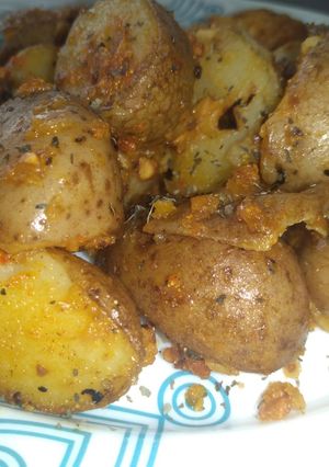 Una foto de Deliciosas papas al ajillo