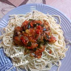 A picture of Spaghetti with sauce.