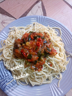 A picture of Spaghetti with sauce.