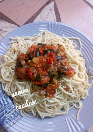 A picture of Spaghetti with sauce.