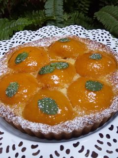 Une photo de Tarte aux pêches a la crème de noix de coco 🍑
