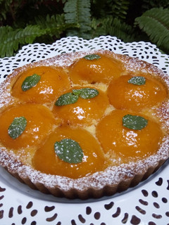 Une photo de Tarte aux pêches a la crème de noix de coco 🍑