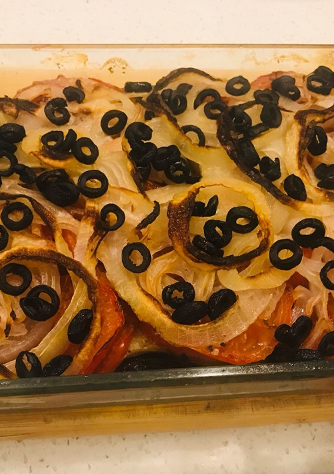 Una foto de Berenjenas y tomates asados con AOVE 🍆 🍅 (vegano)