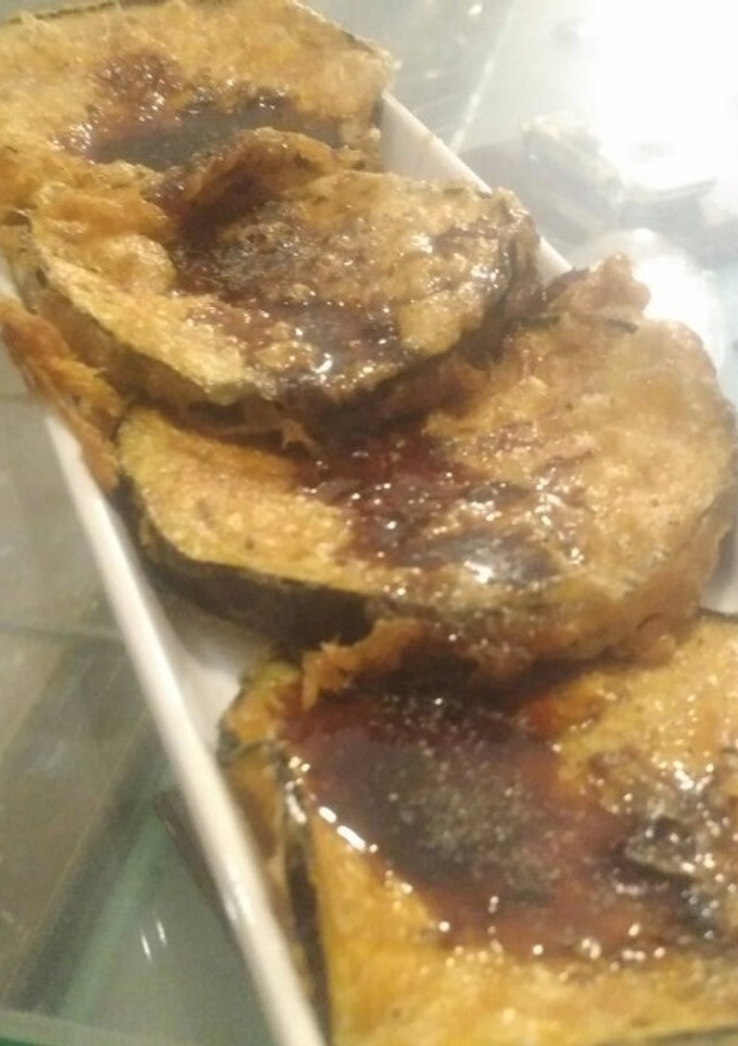 Una foto de Berenejenas fritas a la miel de caña