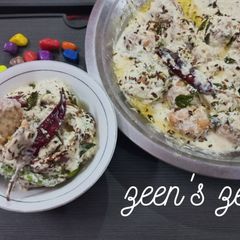 A picture of Whole Black Gram Dahi Vade.
