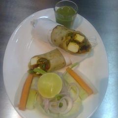 A picture of Onion and capsicum paneer kathi roll.