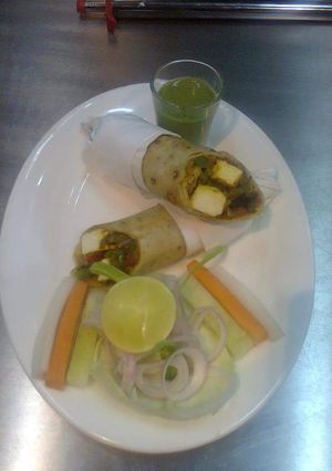 A picture of Onion and capsicum paneer kathi roll.