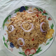 A picture of Jollof rice and beans.