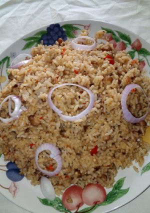 A picture of Jollof rice and beans.
