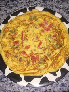Una foto de Tortilla francesa con verduras y ras el hanout