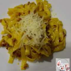 Una foto de Tallarines a la Carbonara